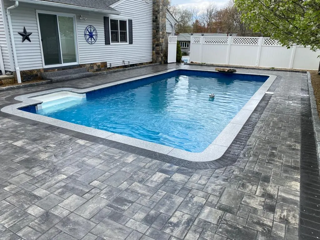 Pool patio with stone surround
