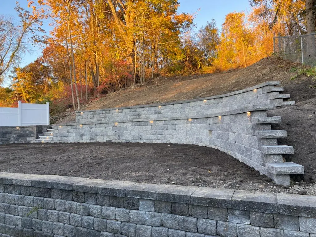 Tiered retaining wall on an autumn property